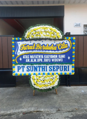 Papan Bunga Duka di Bumi Ayu